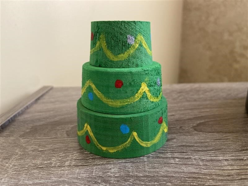 A wooden craft of a christmas tree